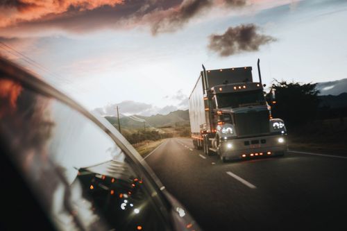 truck driver from car mirror