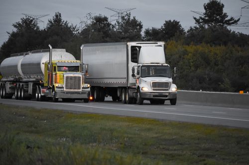 Two Semi Trucks on the Highway